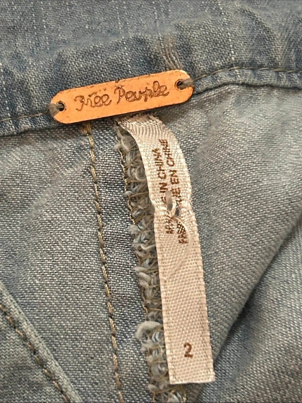 Free People Fara Jumpsuit in a light denim chambray wash size 2